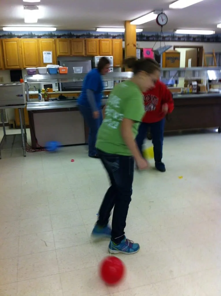 image of people playing balloon game